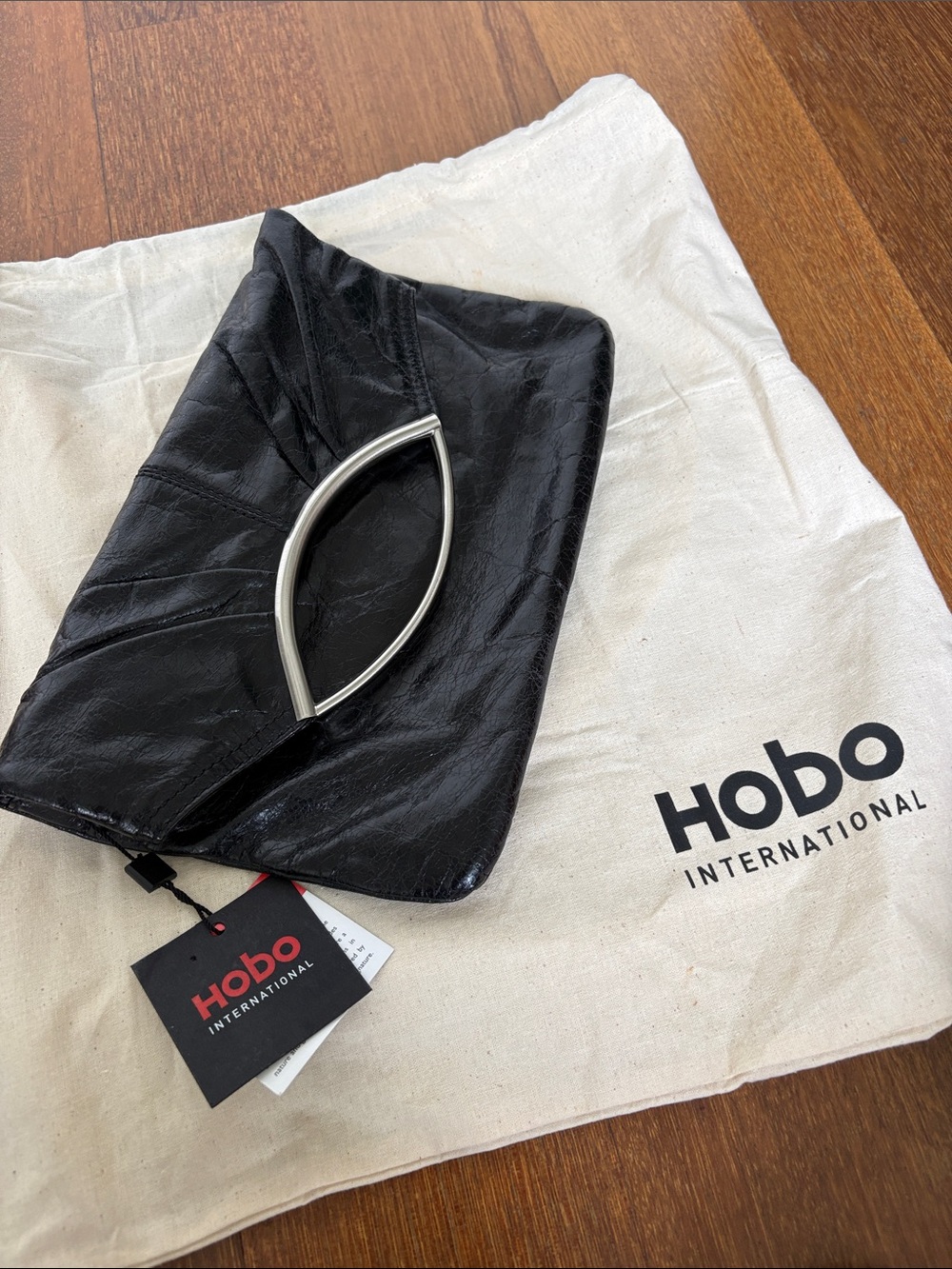 HOBO Black Leather Clutch with Silver-Tone Sculpted Handle
